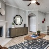 living room with seating table and fire place
